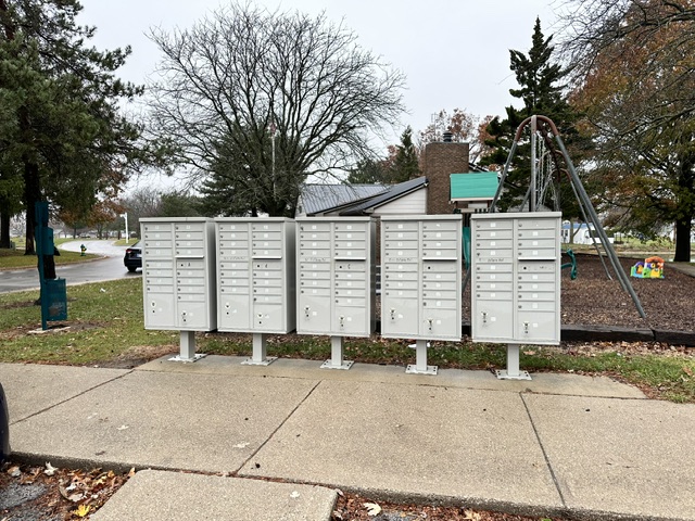 Resident mail area and playground at Swiss Meadows